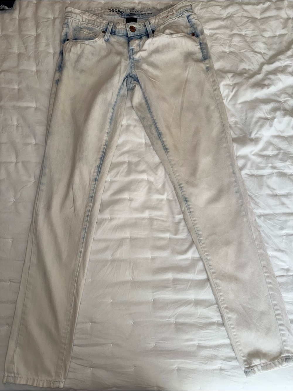 Women's Skinny Light Wash White Jeans with Subtle Blue Accents